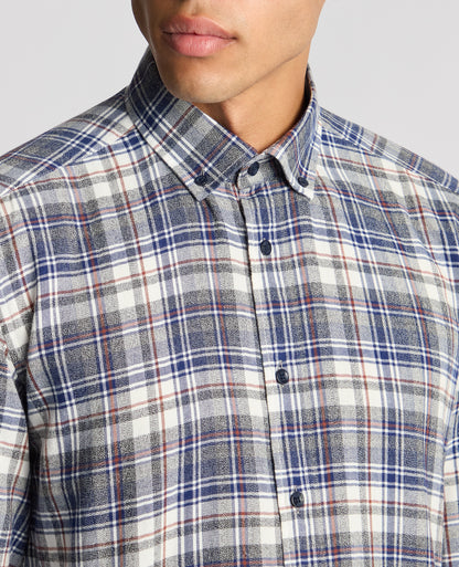 Man wearing a blue Tapered Fit Checked Brushed Cotton Shirt