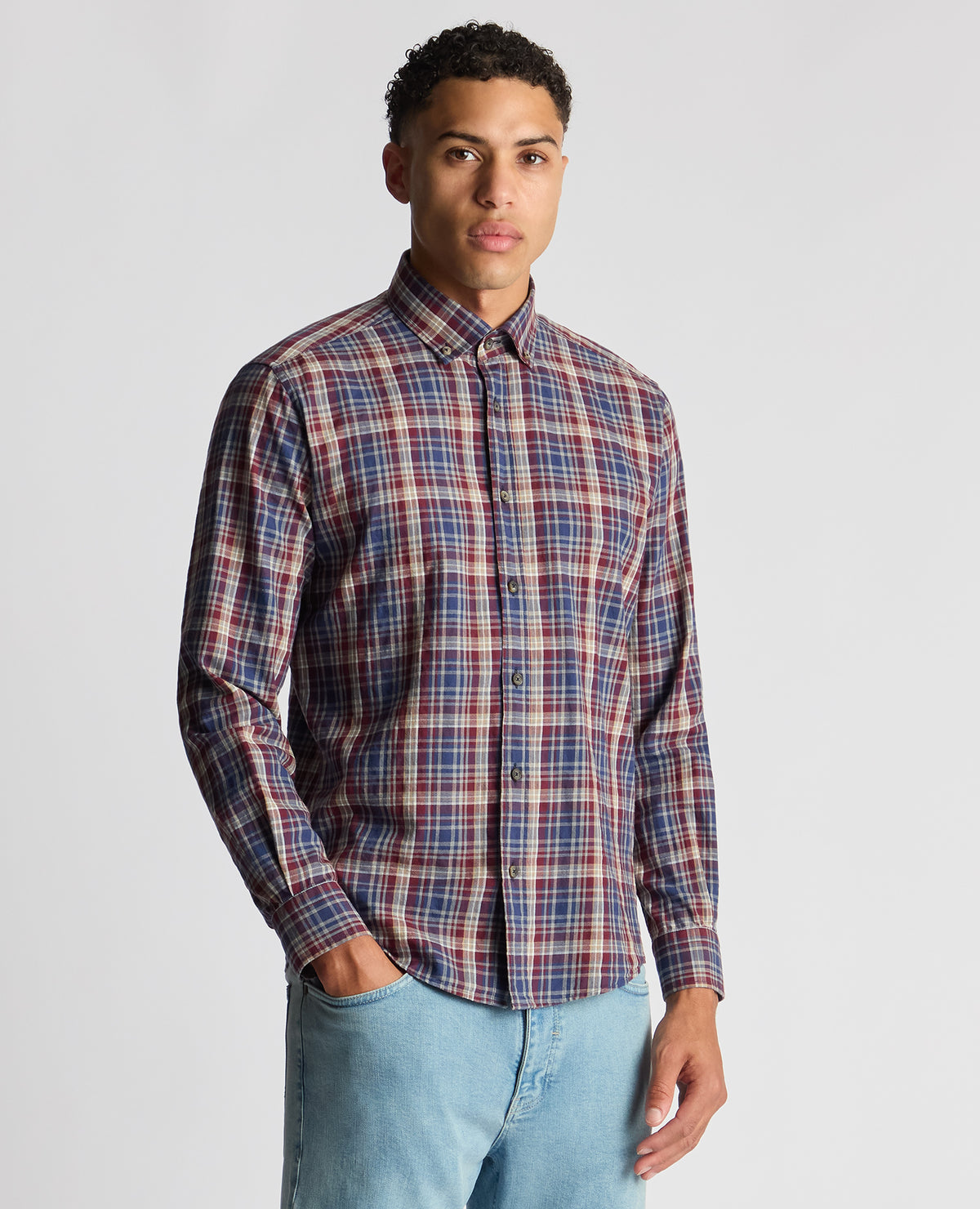Man wearing a red Tapered Fit Checked Cotton Shirt