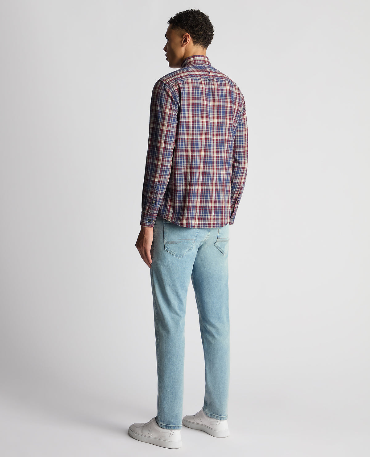 Man wearing a red Tapered Fit Checked Cotton Shirt