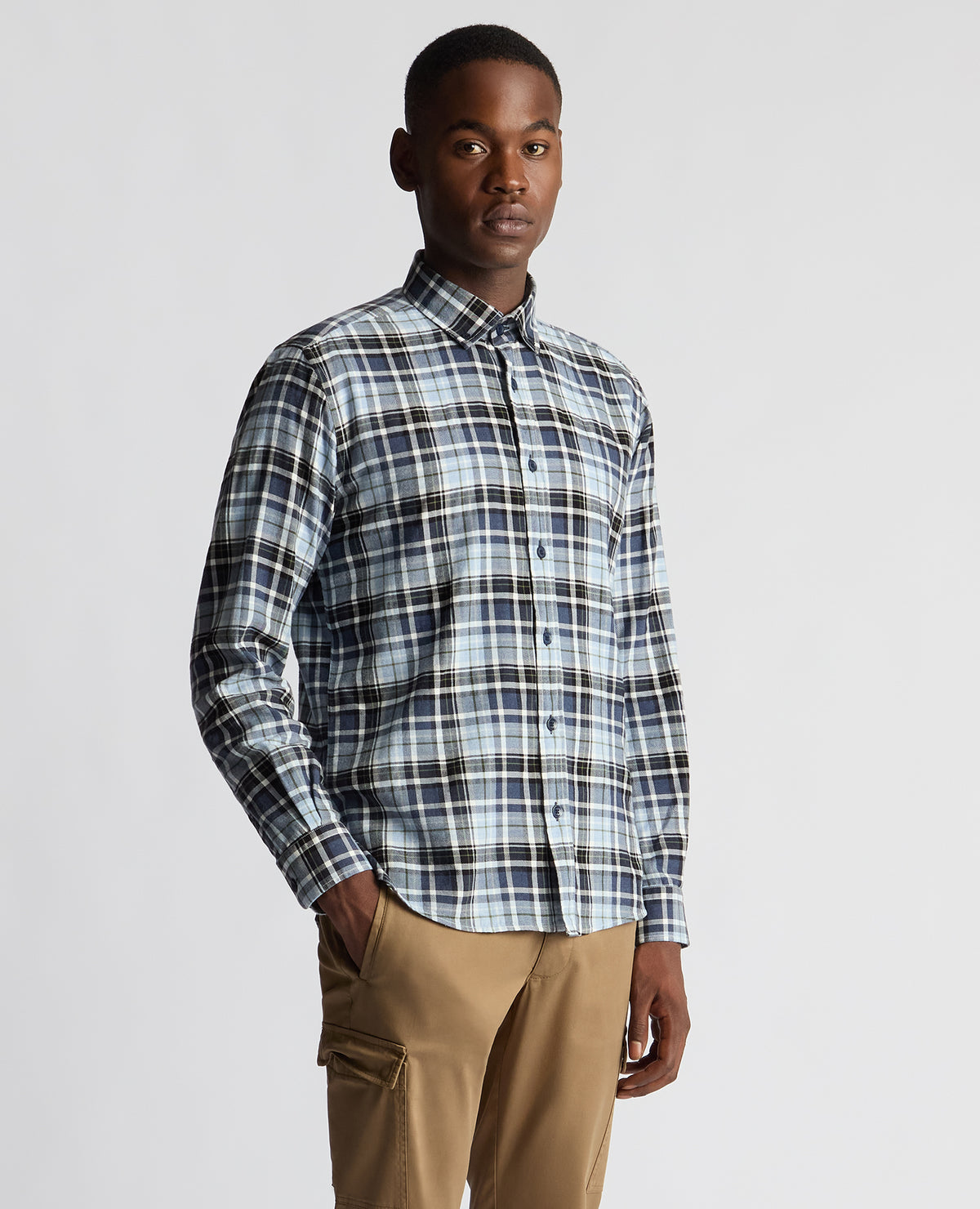 Man wearing a blue Tapered Fit Checked Cotton Shirt