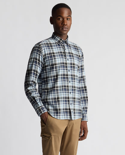 Man wearing a blue Tapered Fit Checked Cotton Shirt