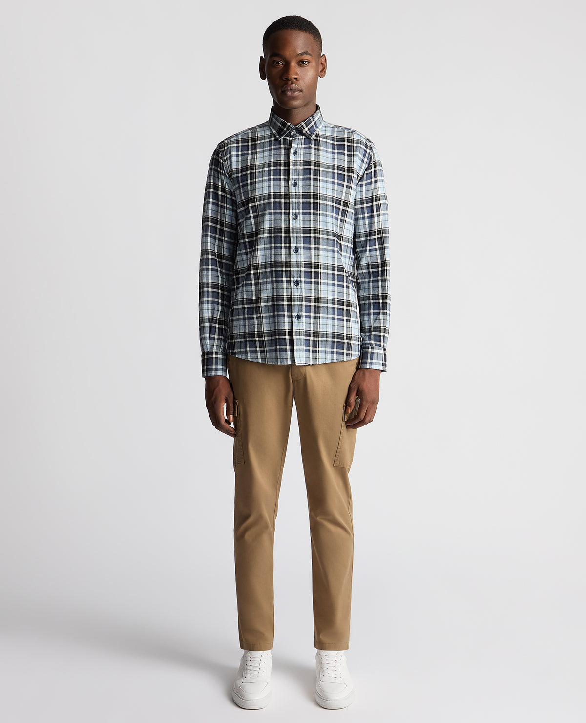 Man wearing a blue Tapered Fit Checked Cotton Shirt