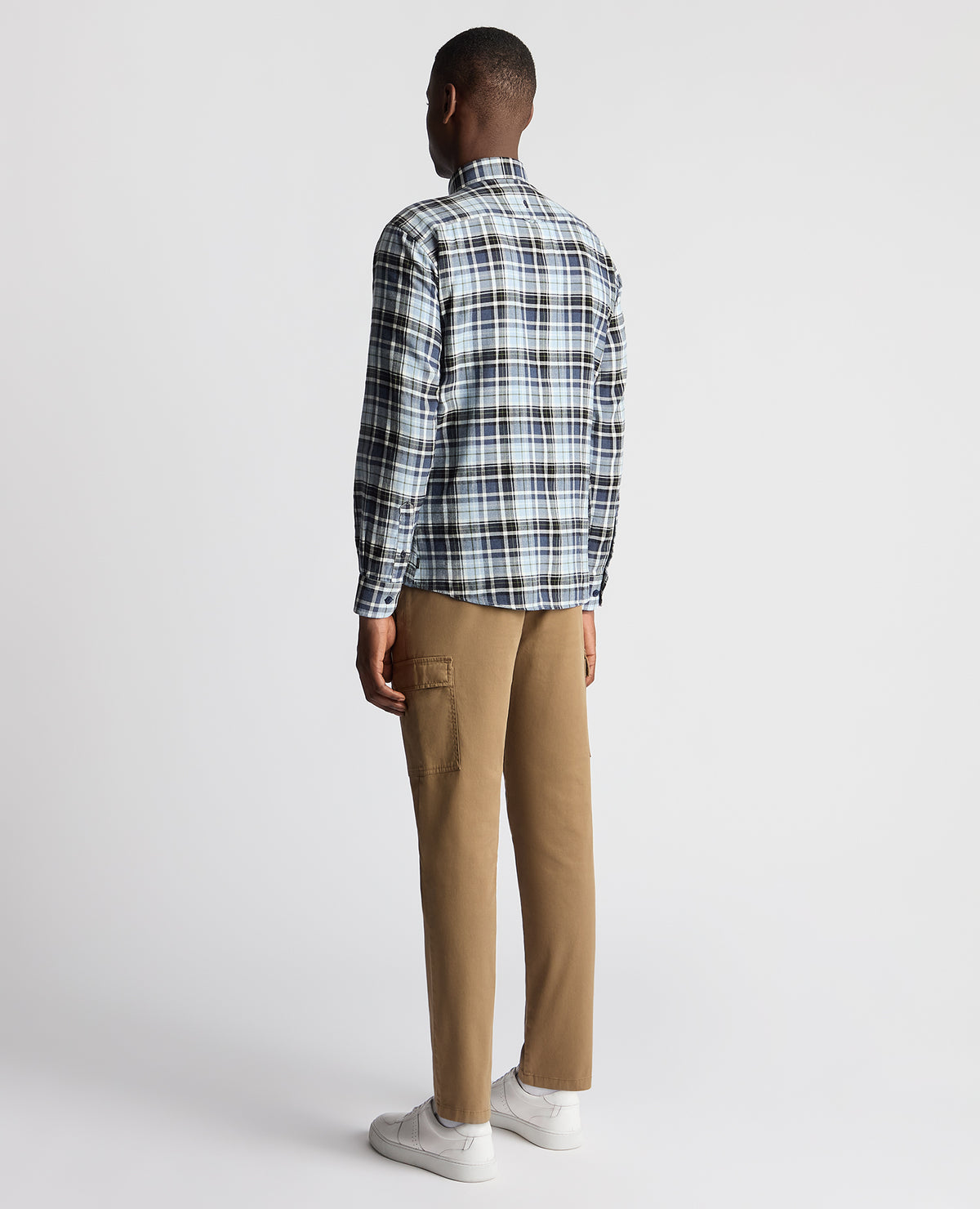 Man wearing a blue Tapered Fit Checked Cotton Shirt