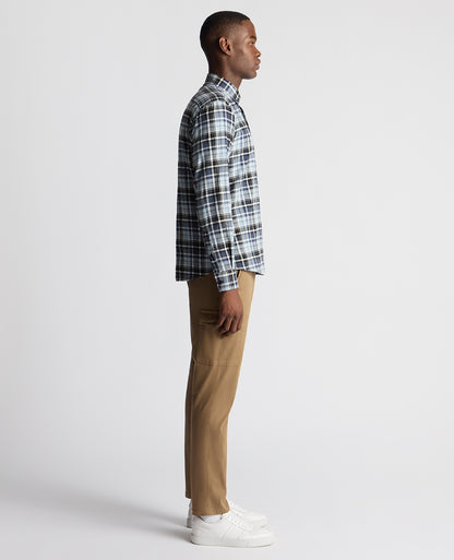 Man wearing a blue Tapered Fit Checked Cotton Shirt