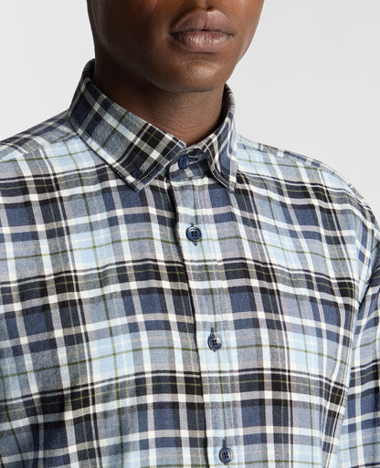 Man wearing a blue Tapered Fit Checked Cotton Shirt