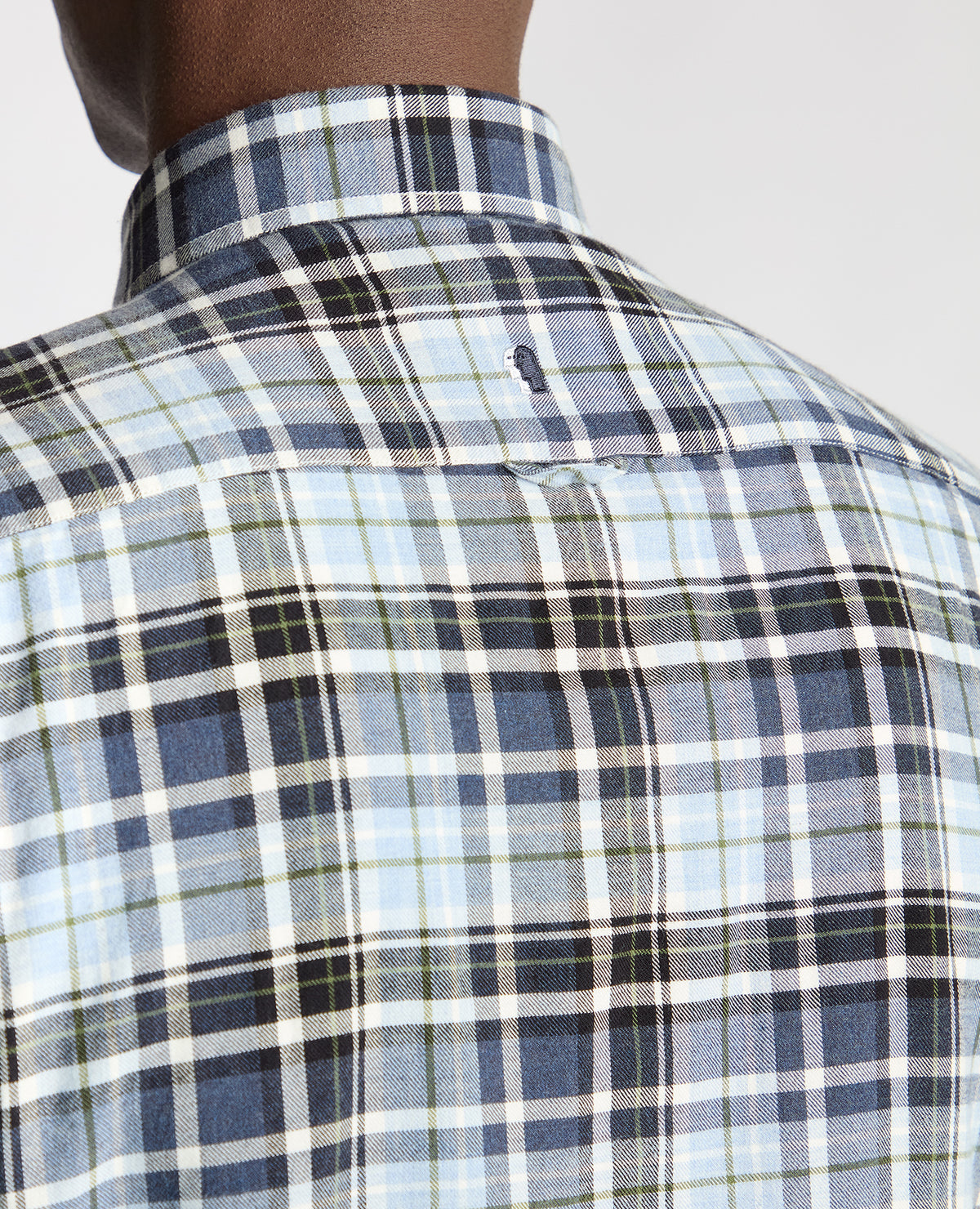 Man wearing a blue Tapered Fit Checked Cotton Shirt