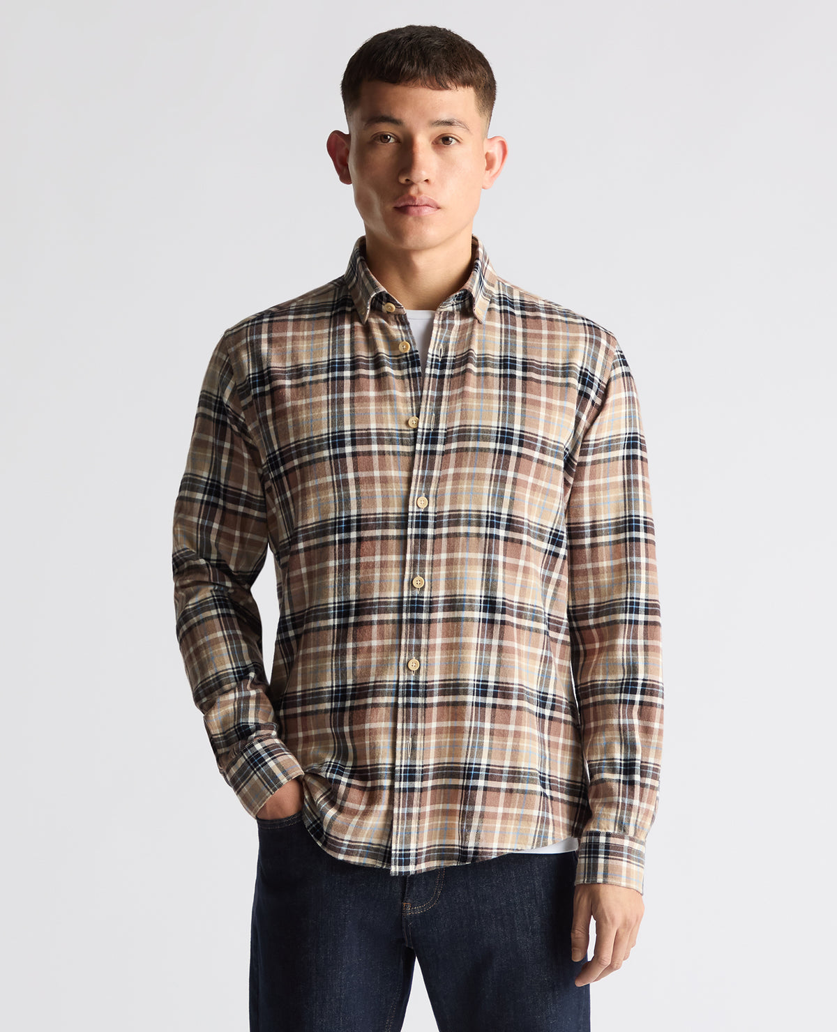 Man wearing a brown casual shirt