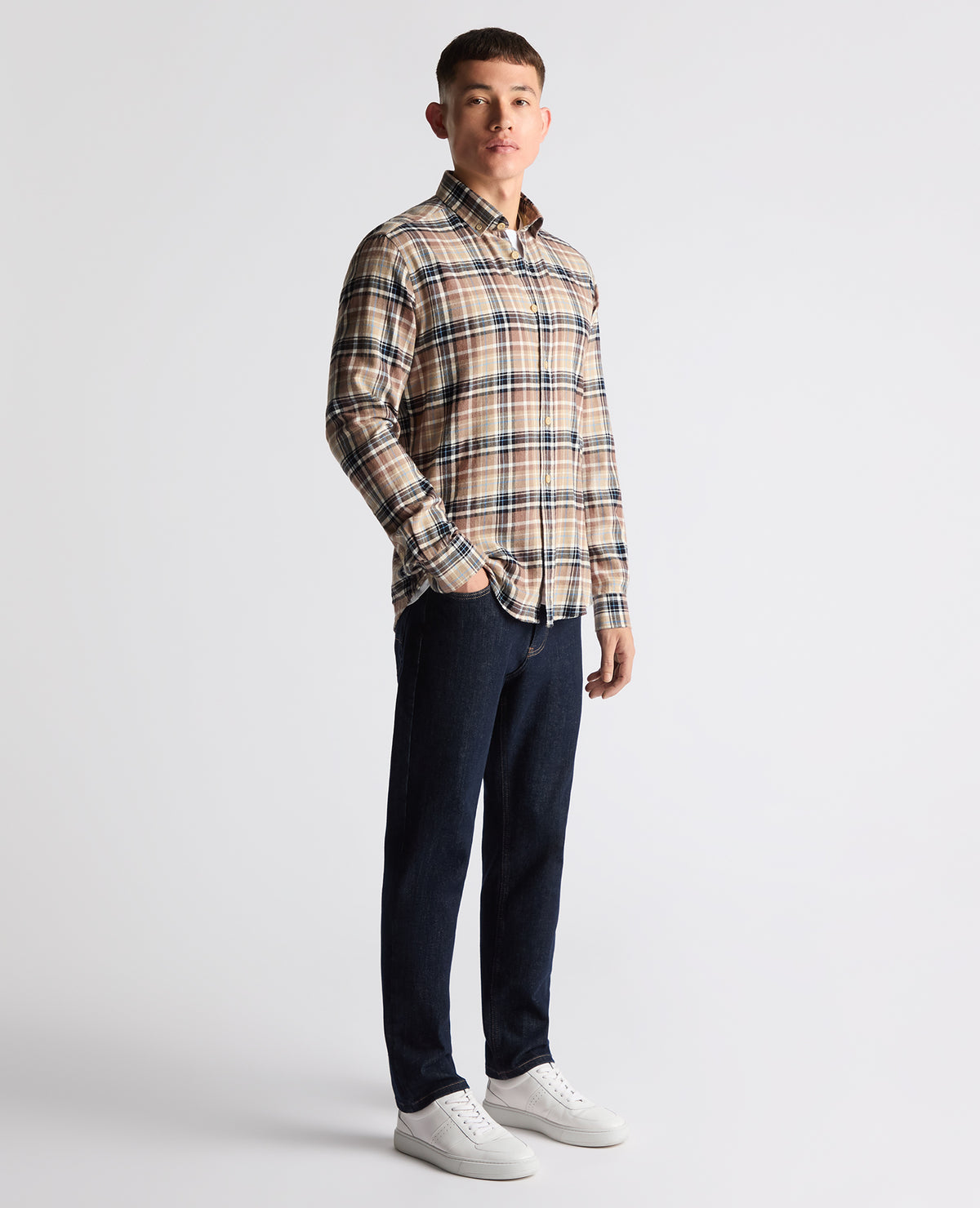 Man wearing a brown casual shirt