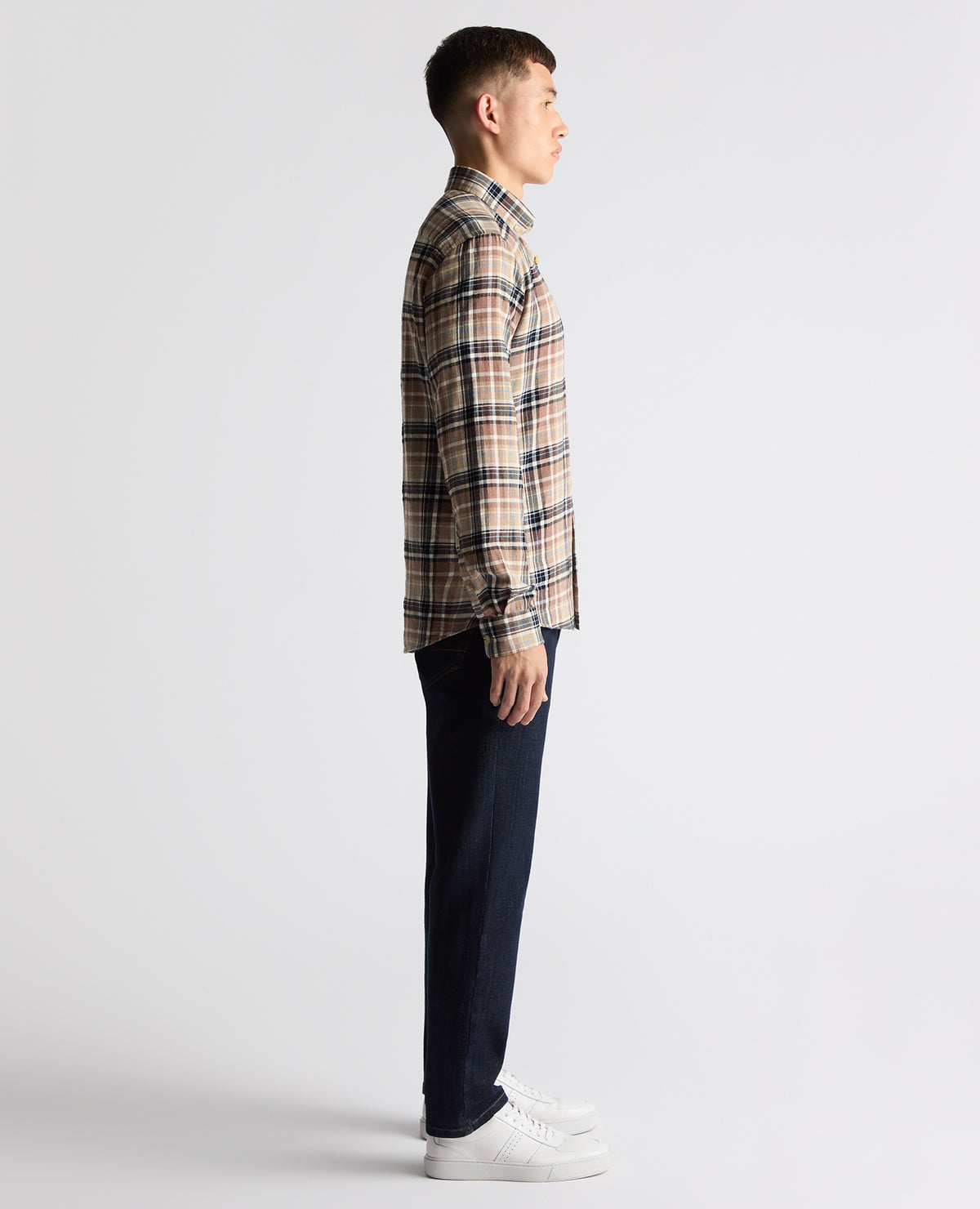 Man wearing a brown casual shirt