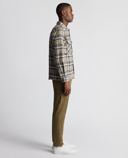 Man wearing a brown Tapered Fit Cotton Checked Overshirt