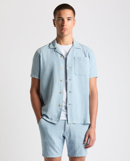 Man wearing a blue Tapered Fit Cotton-Linen Shirt