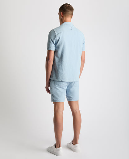 Man wearing a blue Tapered Fit Cotton-Linen Shirt