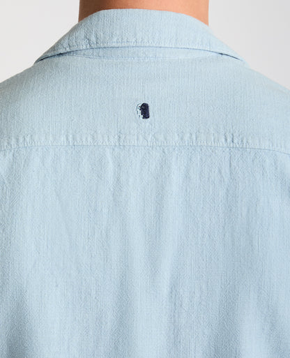 Man wearing a blue Tapered Fit Cotton-Linen Shirt