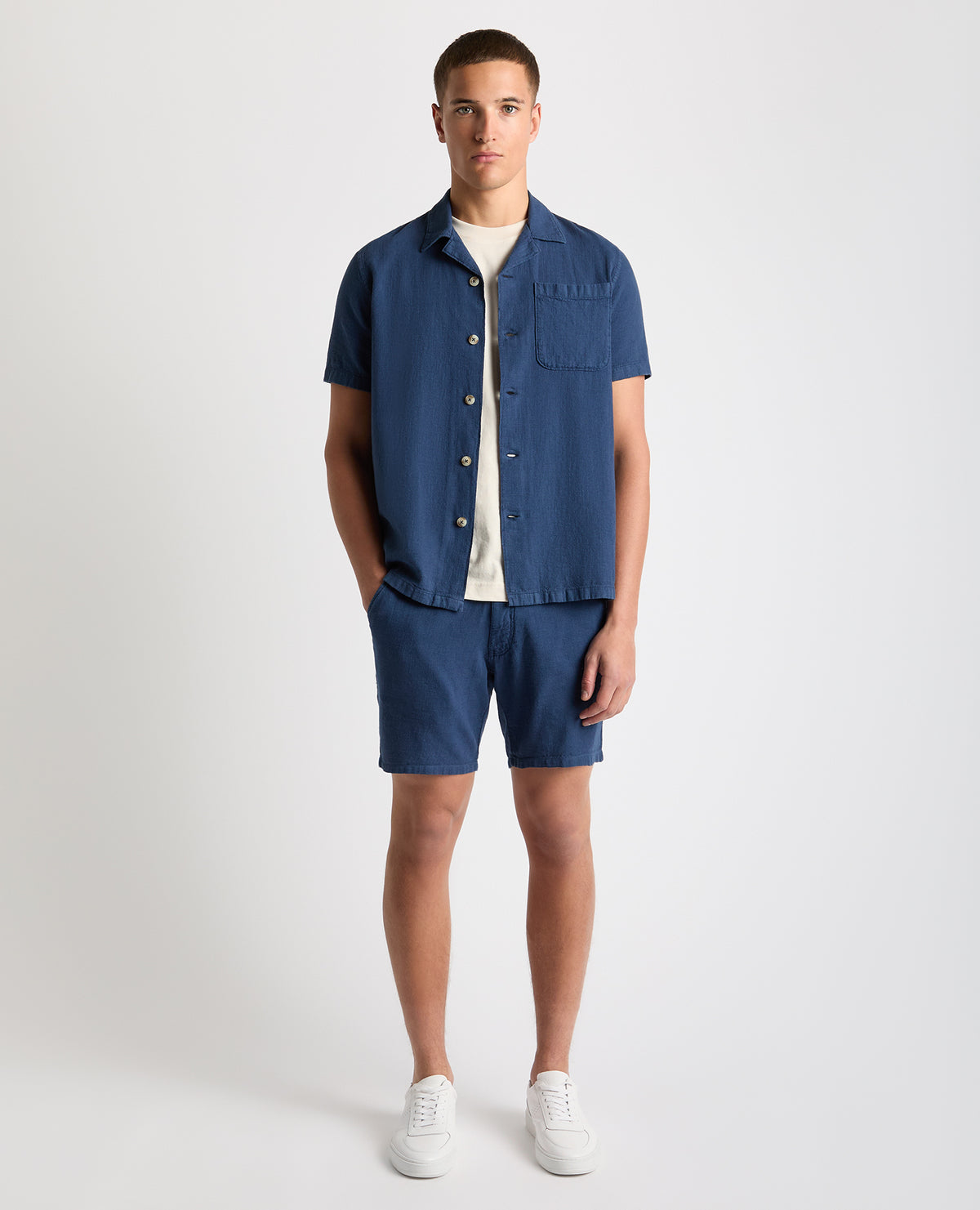 Man wearing a blue Tapered Fit Cotton-Linen Shirt
