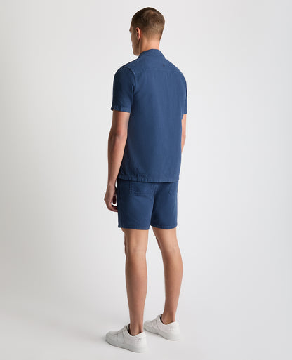 Man wearing a blue Tapered Fit Cotton-Linen Shirt
