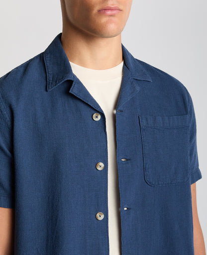 Man wearing a blue Tapered Fit Cotton-Linen Shirt