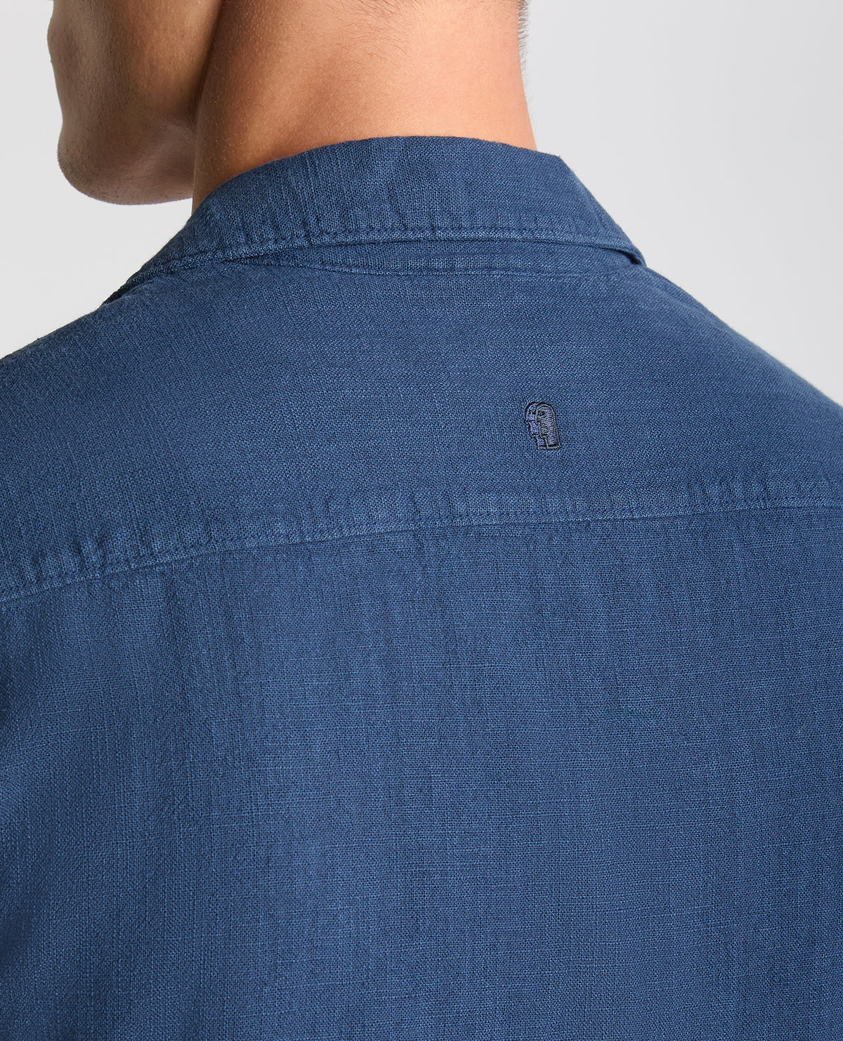 Man wearing a blue Tapered Fit Cotton-Linen Shirt