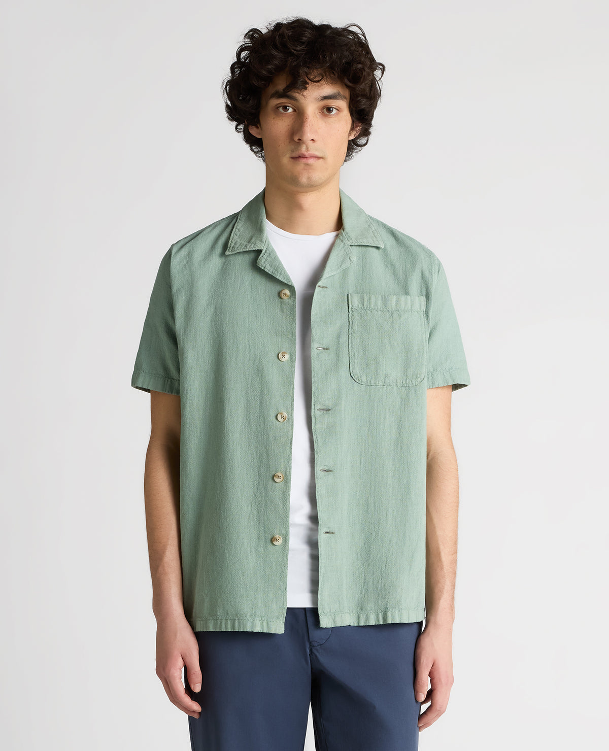 Man wearing a green Tapered Fit Cotton-Linen Shirt