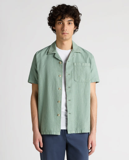 Man wearing a green Tapered Fit Cotton-Linen Shirt