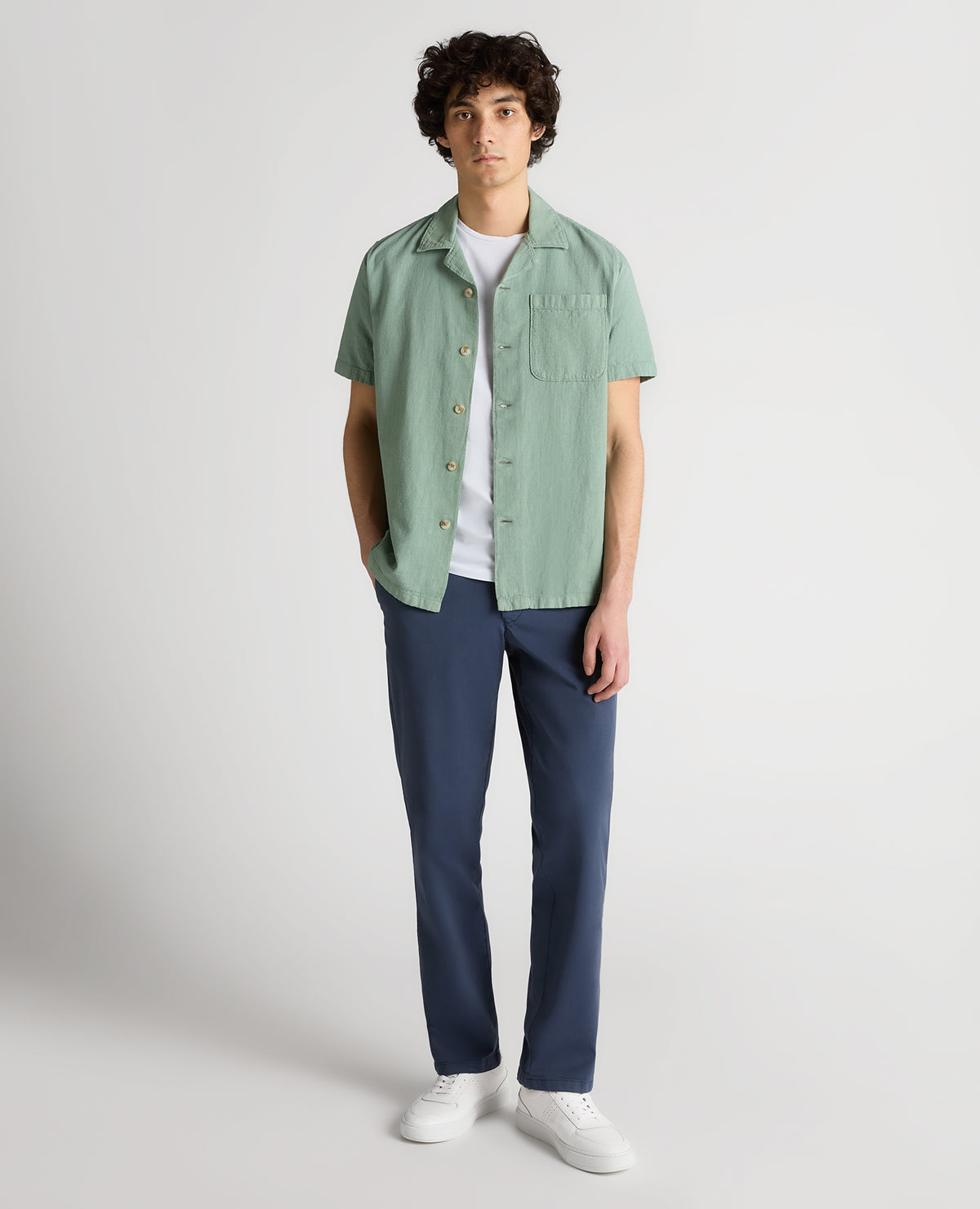 Man wearing a green Tapered Fit Cotton-Linen Shirt