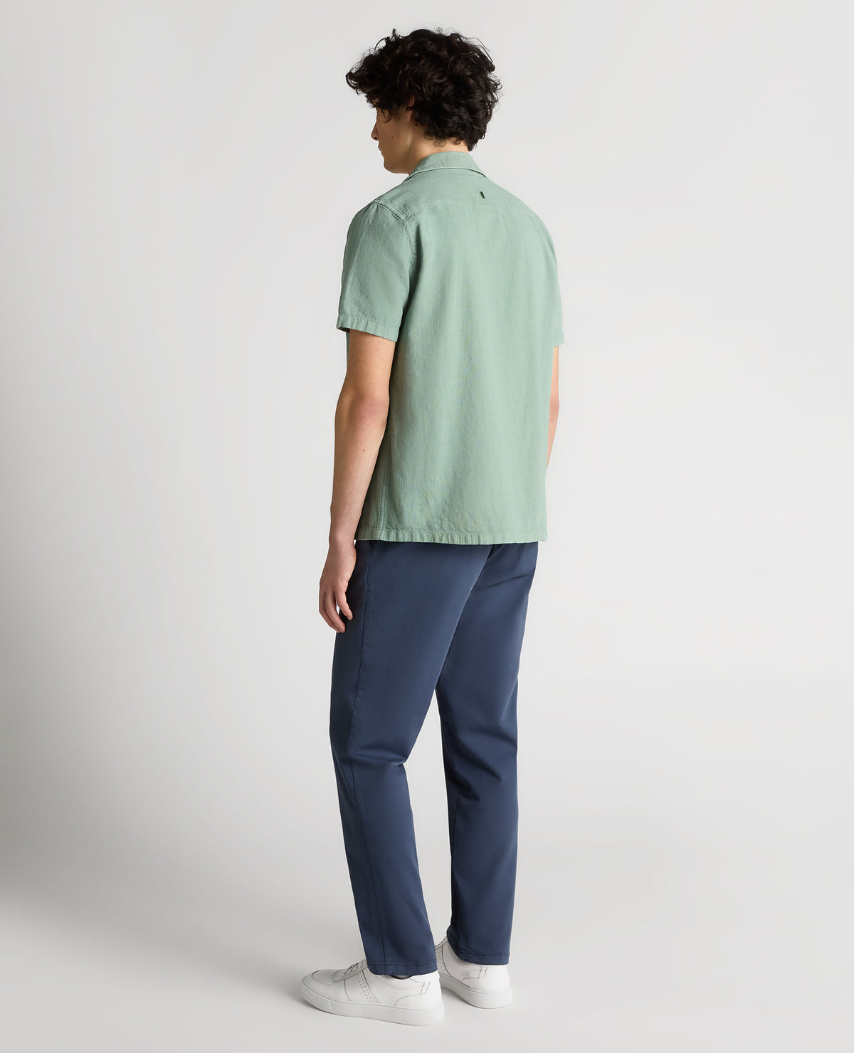 Man wearing a green Tapered Fit Cotton-Linen Shirt