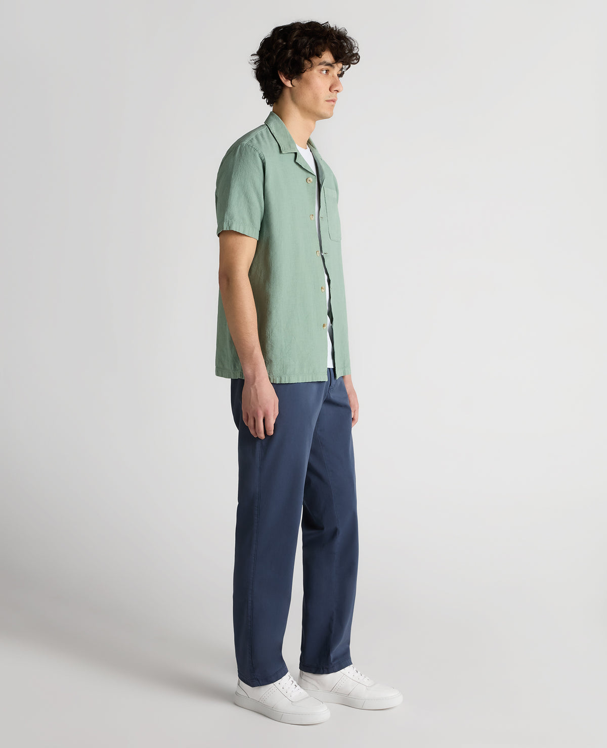 Man wearing a green Tapered Fit Cotton-Linen Shirt