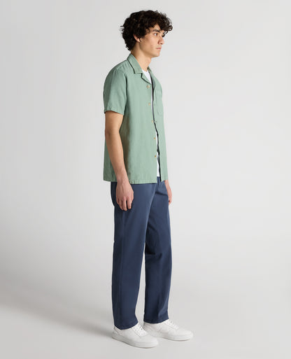 Man wearing a green Tapered Fit Cotton-Linen Shirt