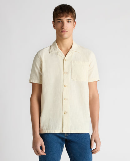 Man wearing a sand Tapered Fit Cotton-Linen Shirt