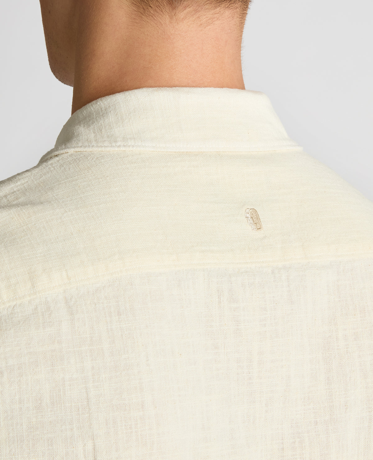 Man wearing a sand Tapered Fit Cotton-Linen Shirt