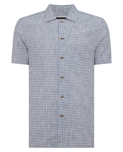 Man wearing a blue Tapered Fit Cotton-Linen Short Sleeve Shirt