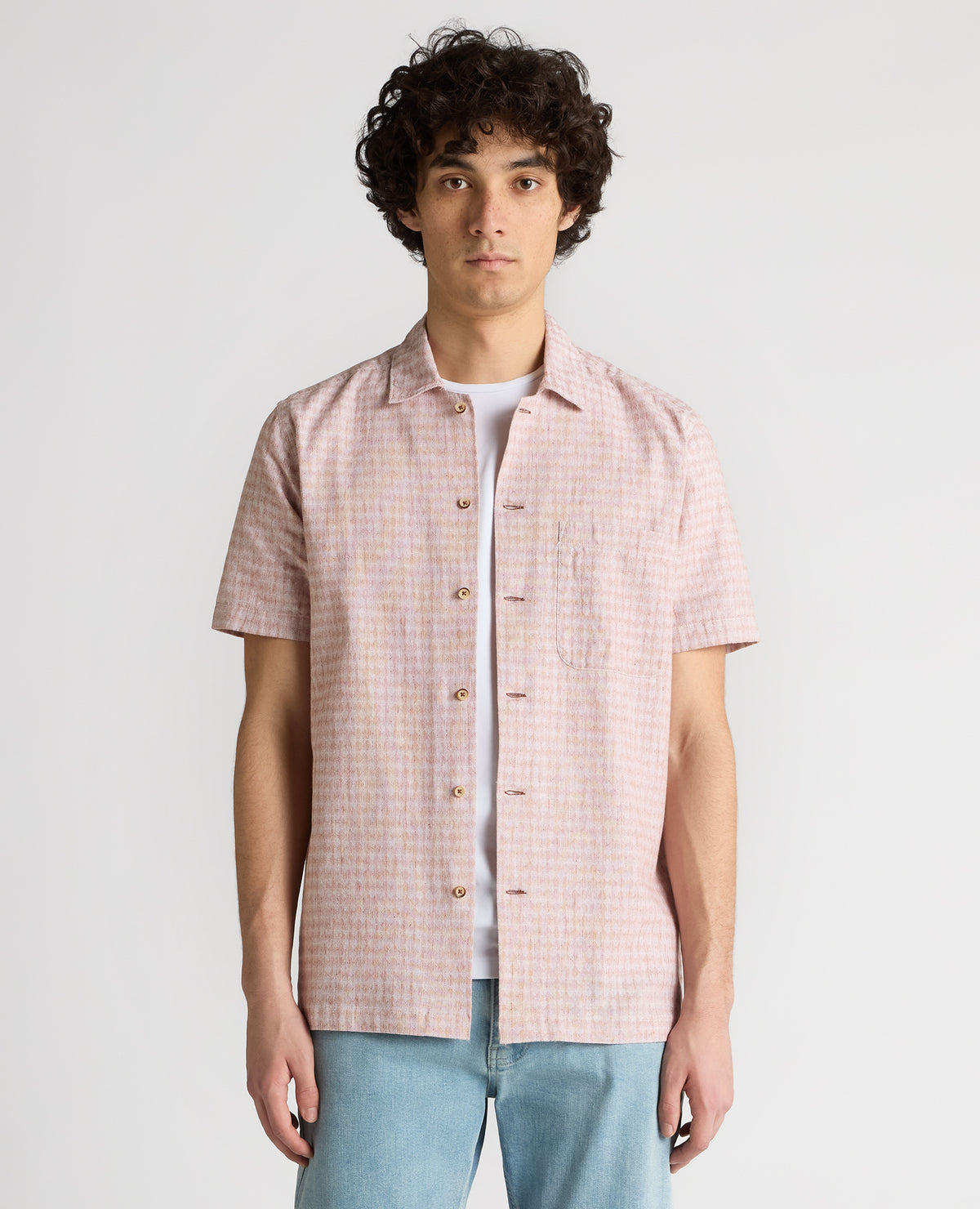 Man wearing a orange Tapered Fit Cotton-Linen Short Sleeve Shirt