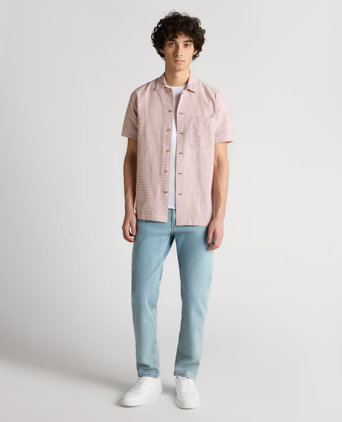 Man wearing a orange Tapered Fit Cotton-Linen Short Sleeve Shirt