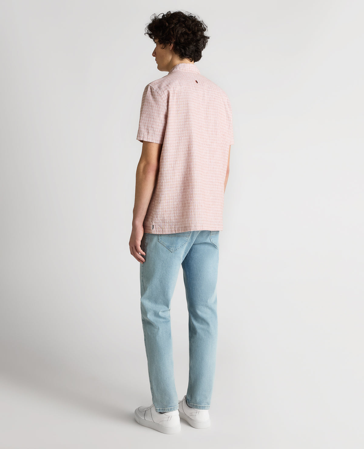 Man wearing a orange Tapered Fit Cotton-Linen Short Sleeve Shirt