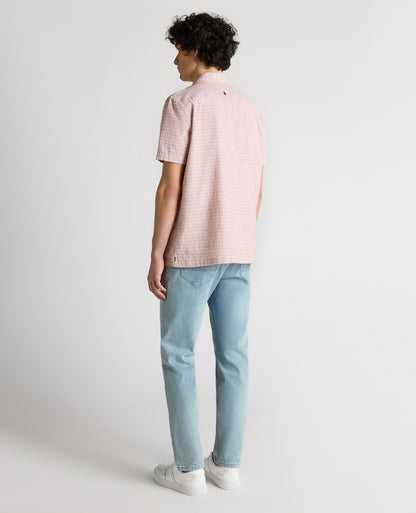 Man wearing a orange Tapered Fit Cotton-Linen Short Sleeve Shirt