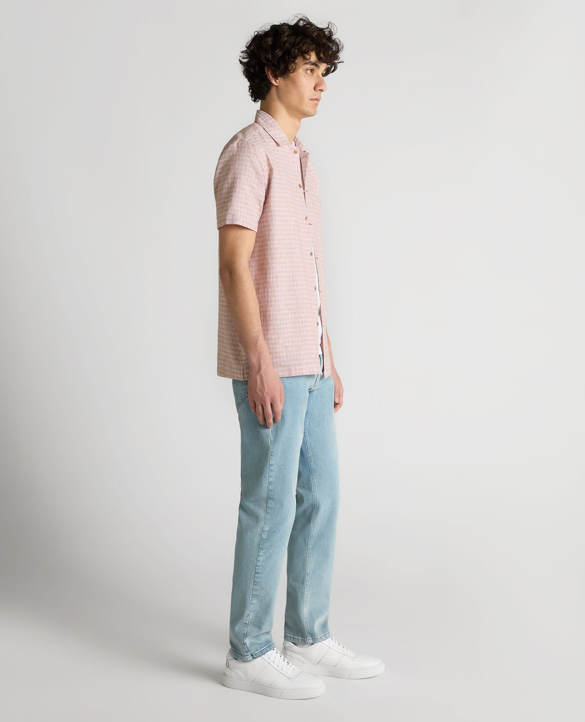 Man wearing a orange Tapered Fit Cotton-Linen Short Sleeve Shirt