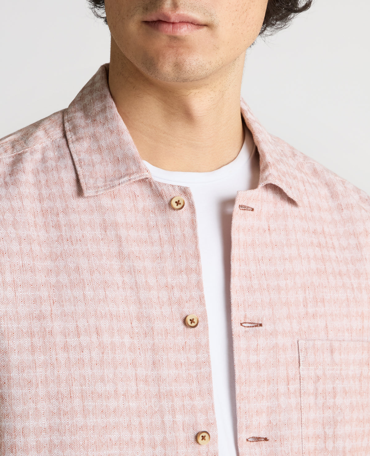 Man wearing a orange Tapered Fit Cotton-Linen Short Sleeve Shirt