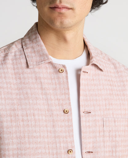 Man wearing a orange Tapered Fit Cotton-Linen Short Sleeve Shirt