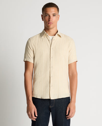Man wearing a sand Slim Fit Striped Organic Cotton-Linen Shirt