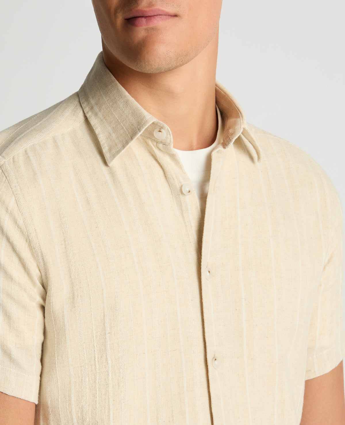Man wearing a sand Slim Fit Striped Organic Cotton-Linen Shirt