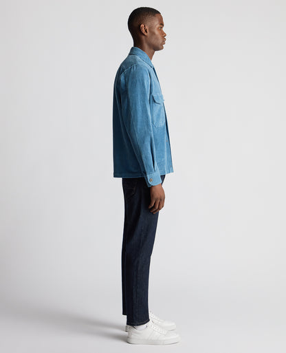 Man wearing a blue Tapered Fit Corduroy Overshirt