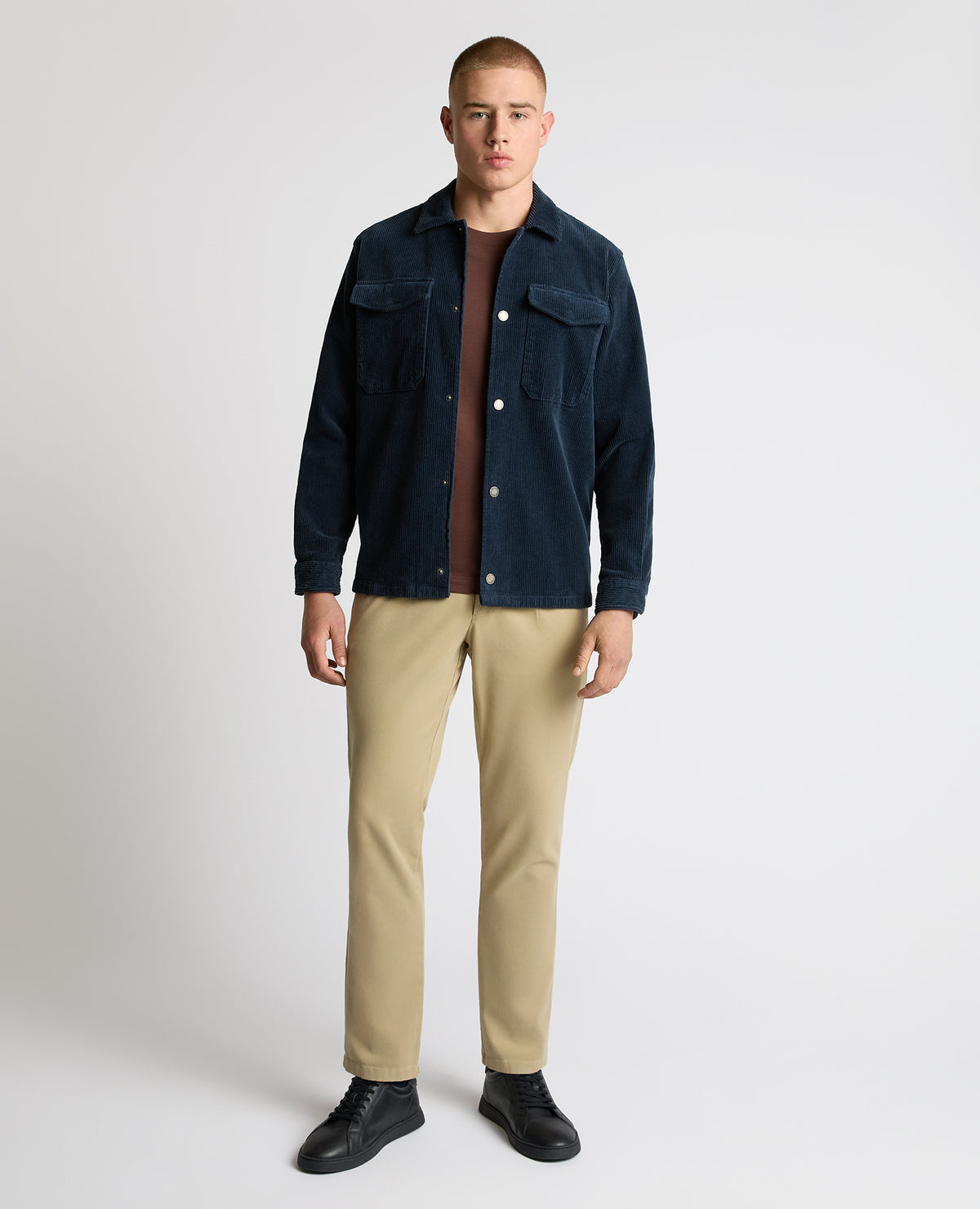 Man wearing a blue casual shirt