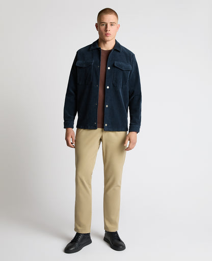 Man wearing a blue casual shirt
