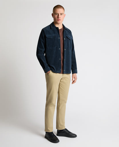 Man wearing a blue casual shirt