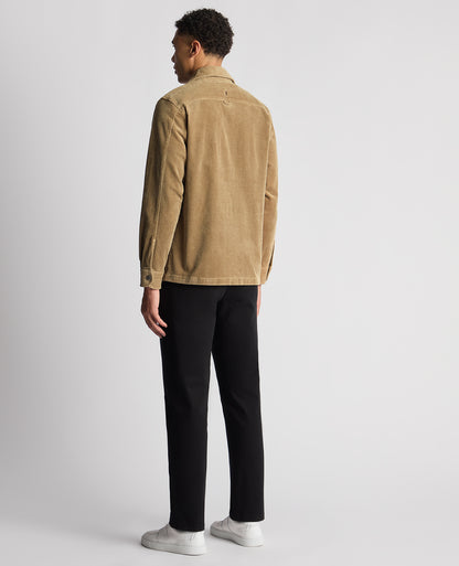 Man wearing a sand Tapered Fit Corduroy Overshirt