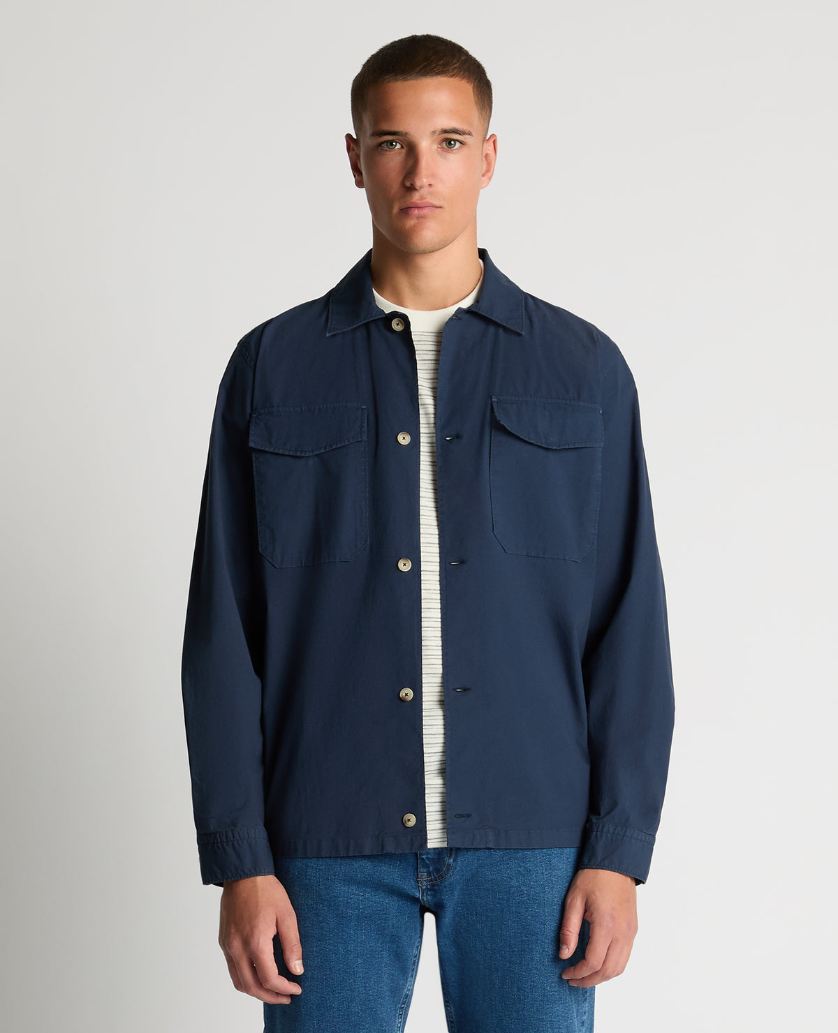 Man wearing a navy Regular Fit Cotton-Stretch Overshirt