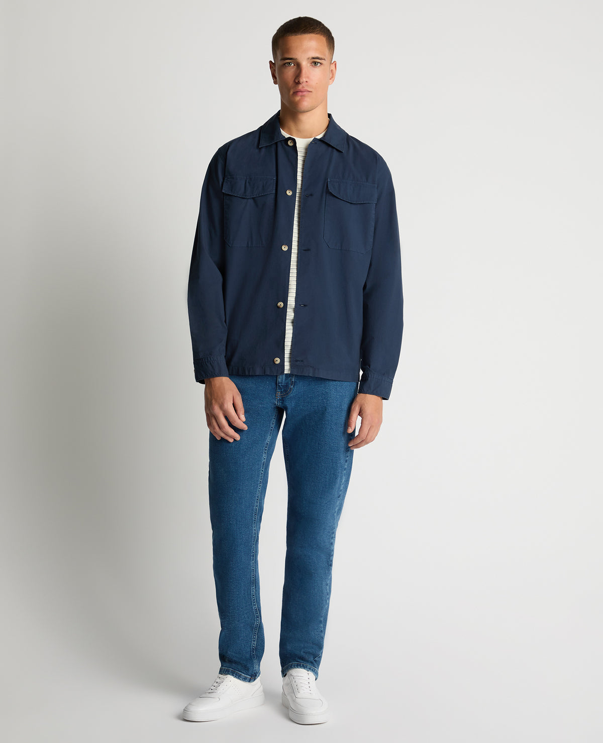 Man wearing a navy Regular Fit Cotton-Stretch Overshirt