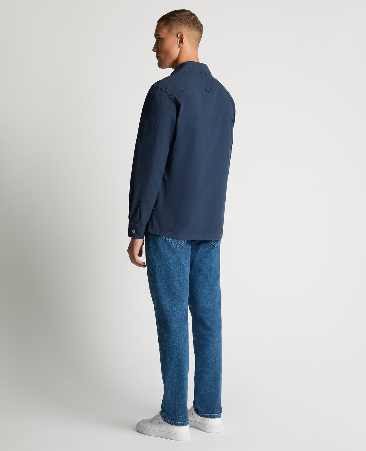 Man wearing a navy Regular Fit Cotton-Stretch Overshirt