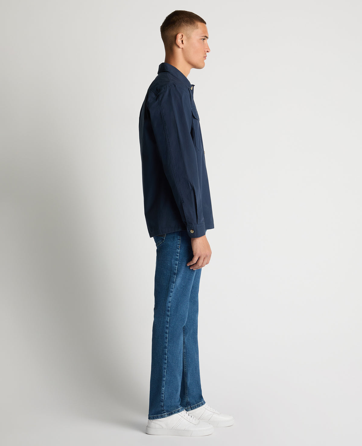 Man wearing a navy Regular Fit Cotton-Stretch Overshirt