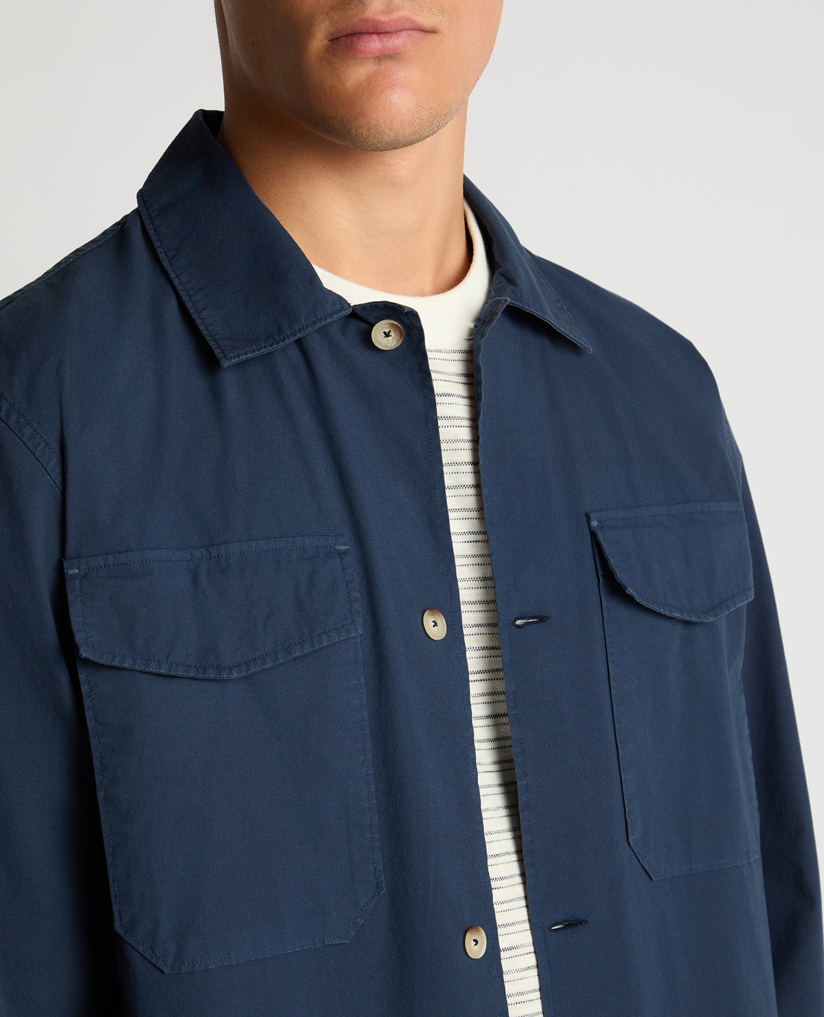 Man wearing a navy Regular Fit Cotton-Stretch Overshirt