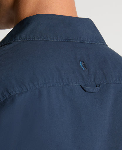Man wearing a navy Regular Fit Cotton-Stretch Overshirt